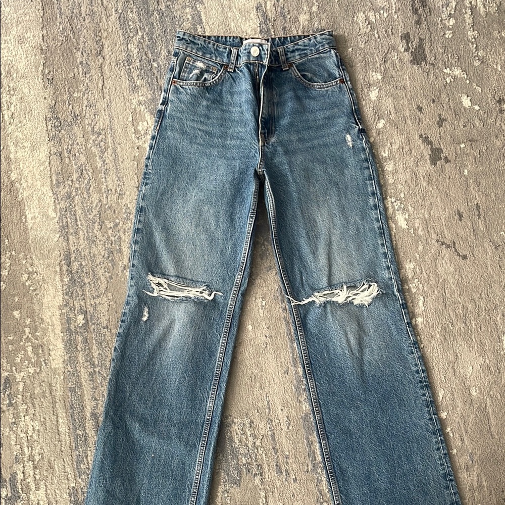 Distressed Blue Jeans